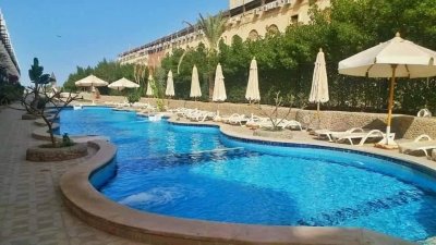 Spacious furnished one-bedroom apartment with private beach in El Ahyaa, Hurghada. Near El Gouna
