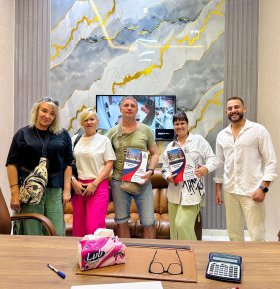 Family after signing an apartment purchase contract in Hurghada